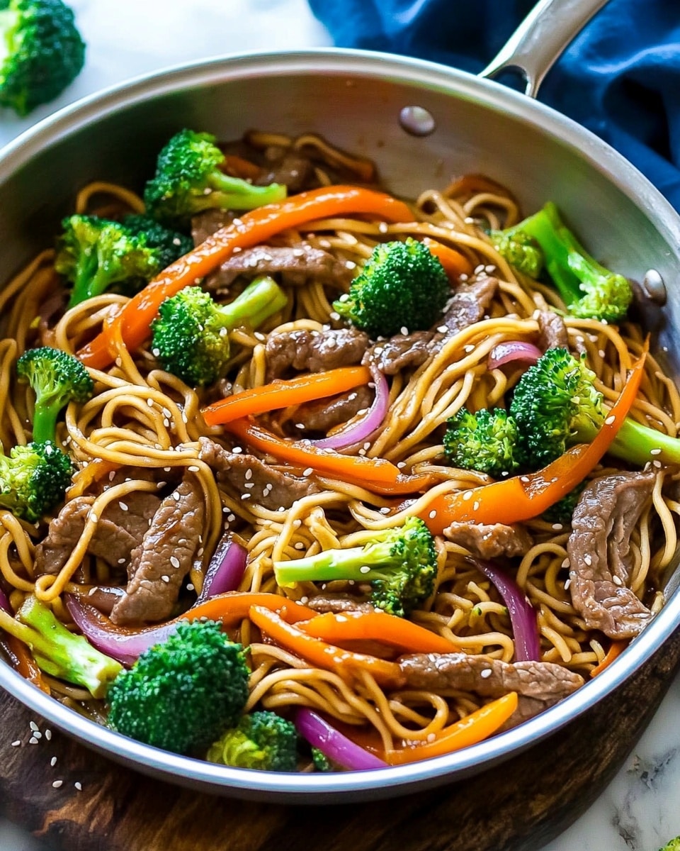 The image shows a close-up of a pan filled with a stir-fry dish. The bottom layer has light brown cooked noodles with a slight shine, mixed with thin strips of cooked beef that are dark brown with a tender texture. Bright green broccoli florets are scattered over the beef and noodles, adding a fresh contrast. Thin slices of orange bell pepper and pale purple onion are spread evenly throughout, giving more color and texture. The dish is sprinkled with small white sesame seeds, adding small dots of texture on top. The pan is seen against a white marbled surface. photo taken with an iphone --ar 4:5 --v 6.1