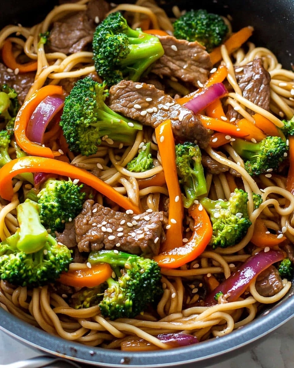 A pan filled with a stir-fry dish showing about four layers: at the bottom, coiled light tan noodles; next, bright orange sweet pepper strips and soft reddish-purple onion slices spread evenly; above them, vibrant green broccoli florets scattered around; on top, thin brown slices of cooked beef mixed throughout. Small white sesame seeds are sprinkled over all ingredients. The pan sits on a white marbled surface. photo taken with an iphone --ar 4:5 --v 6.1